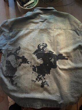 Knockout mens Denim Jacket with Black Stenciled Graphic Backsplash